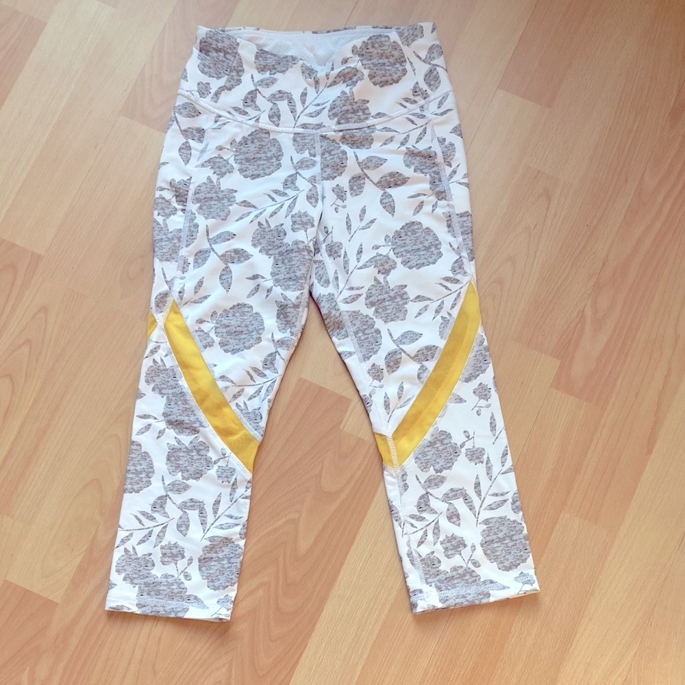 Calia: by Carrie Underwood.  Nylon/spandex workout capris size XS.